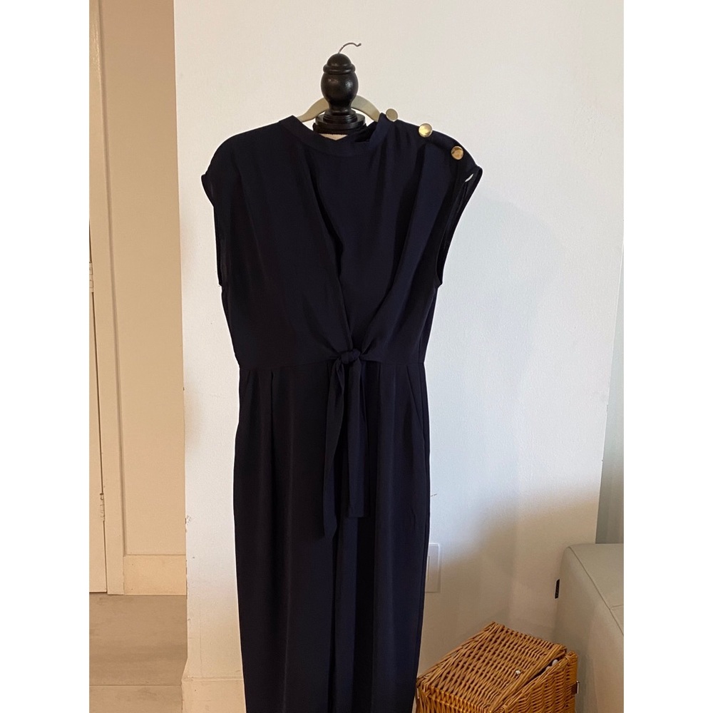 Jumpsuit with front knot and shoulder buttons